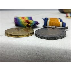 WW1 pair of medals comprising British War Medal and Victory Medal awarded to T4-088269 Dvr. P. Stather A.S.C.; with group of three WW1 miniatures including 1914-15 Star; all with ribbons; and two inert brass cased shells each marked Karlsruhe H16cm