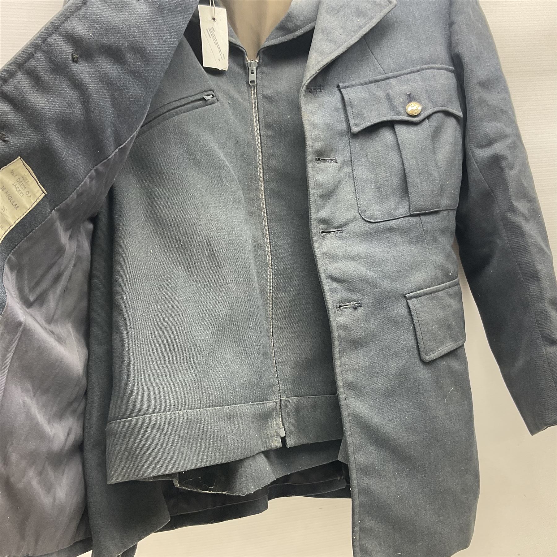 Two air force jackets, together with two helmets and Bamberger Mutzen Industrie German military hat and two others 