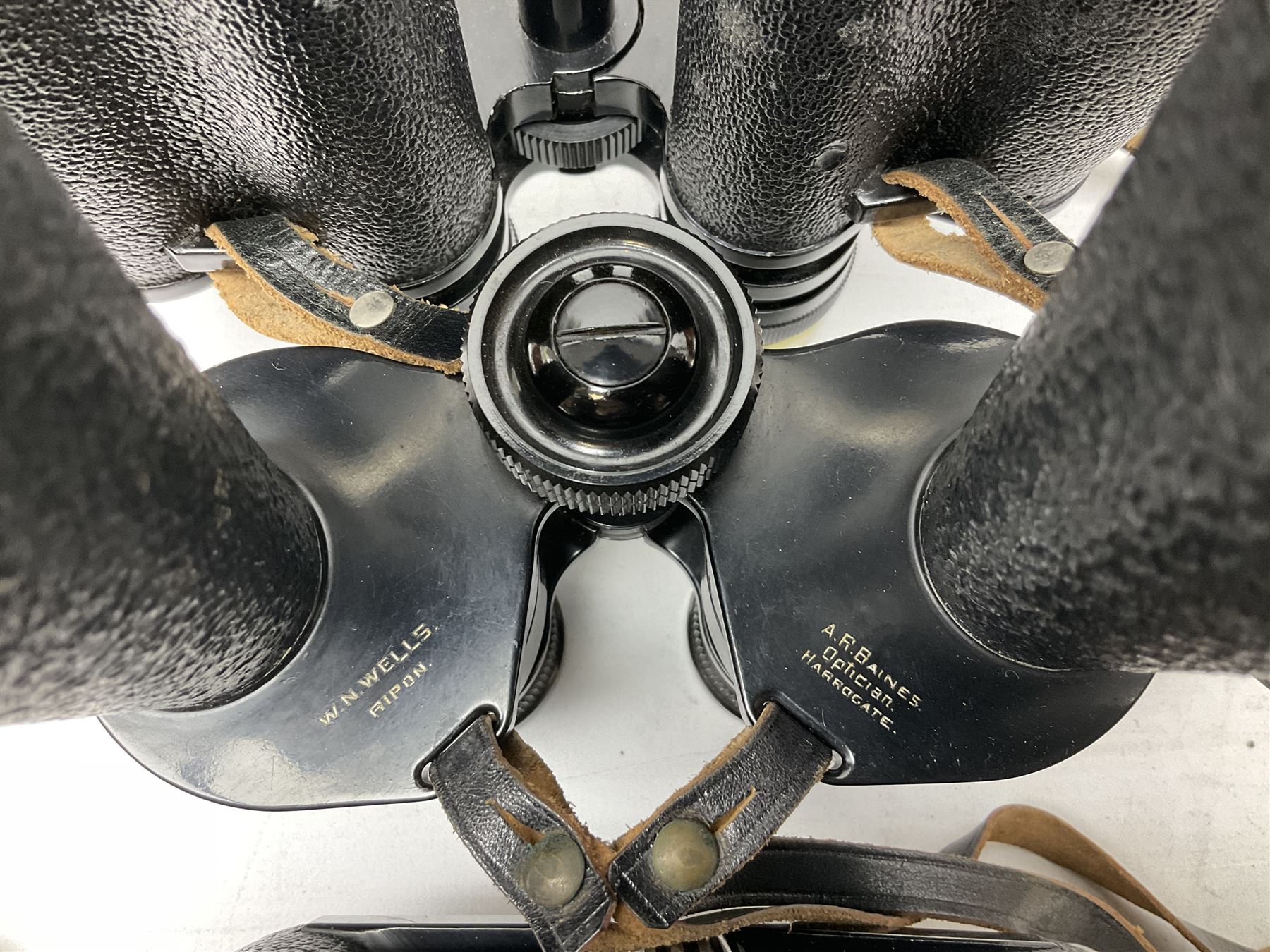 Ten cased pairs of binoculars, to include Rainbow 20x60, Barr & Stroud 7x, Yashica 7x50, Ross London Stepmur 10x50, Wray London Defiant 10x35, Canon 8x30 etc