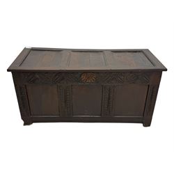 18th-century carved oak blanket chest with hand-carved floral and leaf motifs 