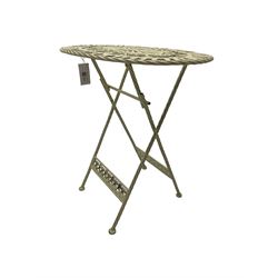 Washed white finish metal garden folding table, strap seat, pierced oval top with foliate decoration, raised on rope twist supports united by fretwork stretcher