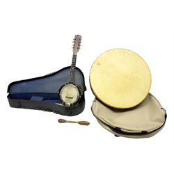 Dulcet eight-string banjo mandolin with mother-of-pearl inlaid ebonised fingerboard L55.5cm; cased; and Irish mahogany bodhran hand drum with inlaid stringing and vellum top D46.5cm; in soft carrying case with double ended beater (2)