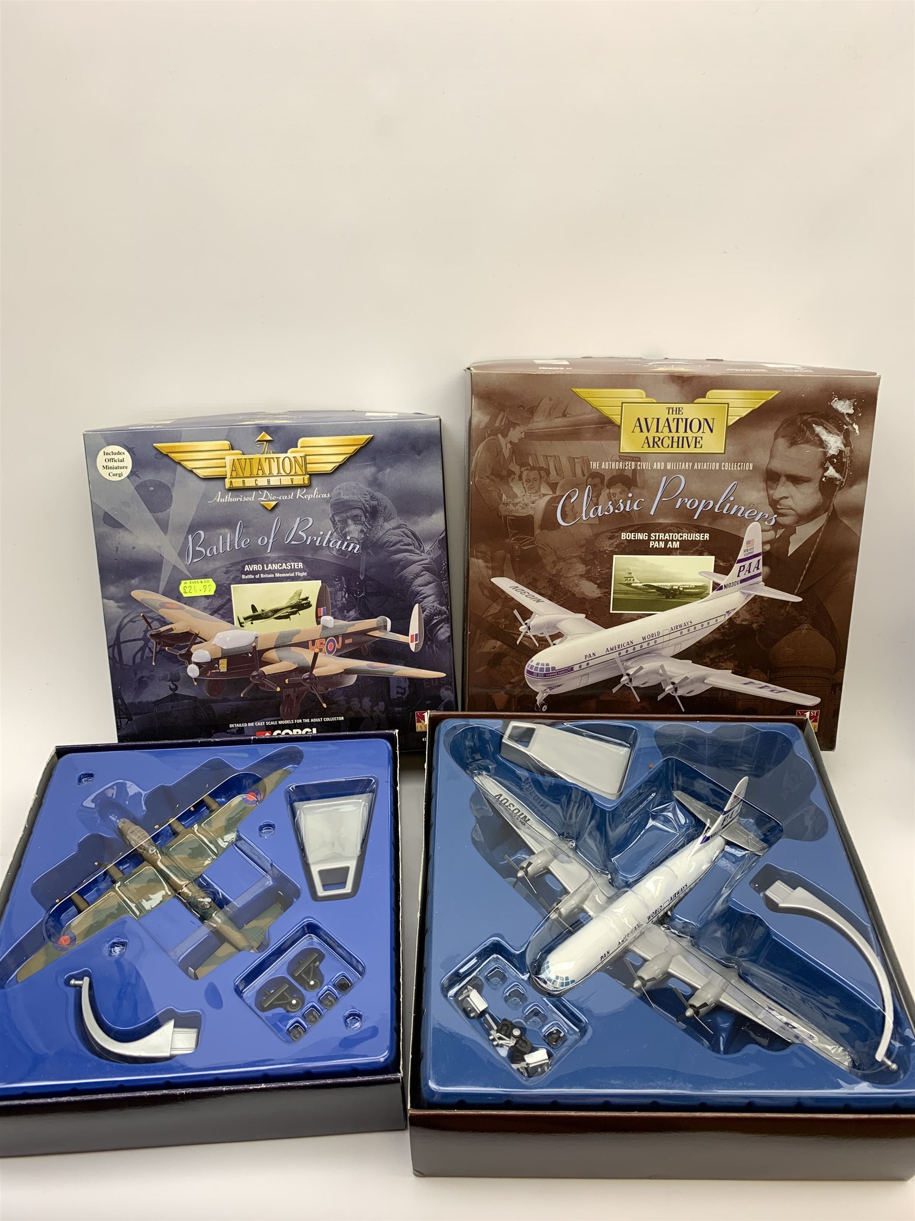 Five Corgi Aviation Archive 1/144th scale aircraft - 47301 Battle of Britain Avro Lancaster, limited edition AA31201 Military Avro Vulcan No.1657/2300 with certificate, limited edition 48505 Military DH Comet 4C No.3000/4000, 47506 Military Lockheed Constellation and 48101 Classic Propliners Boeing Stratocruiser Panm Am; all boxed