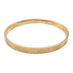 Early 20th century rose gold bangle, stamped 9ct, approx 10.4gm