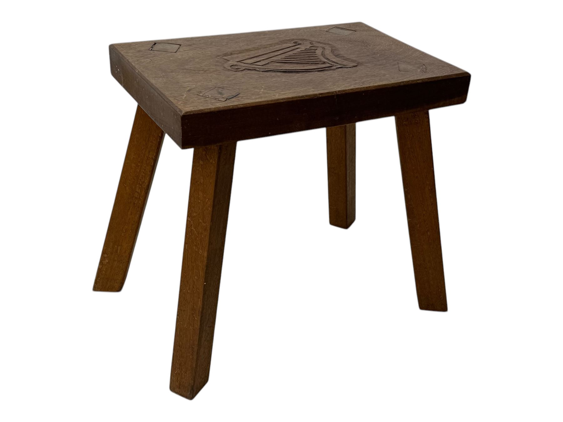 Late 19th century black-painted cane seat chair; early 20th century radial spindle-back chair with green upholstery; early 20th century mahogany single-drawer side table; mid-20th century carved wooden stool with harp motif; early 20th century hexagonal bamboo stand; two oval mirrors (7)