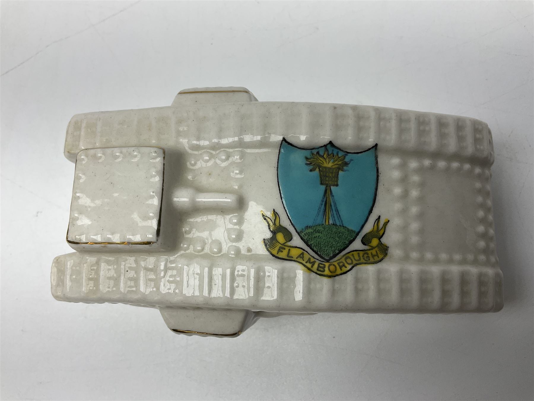 Ten WW1 crested china military models of tanks and field guns; various makers including Goss, Grafton China, Arcadian China, Savoy China etc; various crests including Portsmouth, Brighton, Pendleton, Paignton, Cowes, Flamborough etc (10)