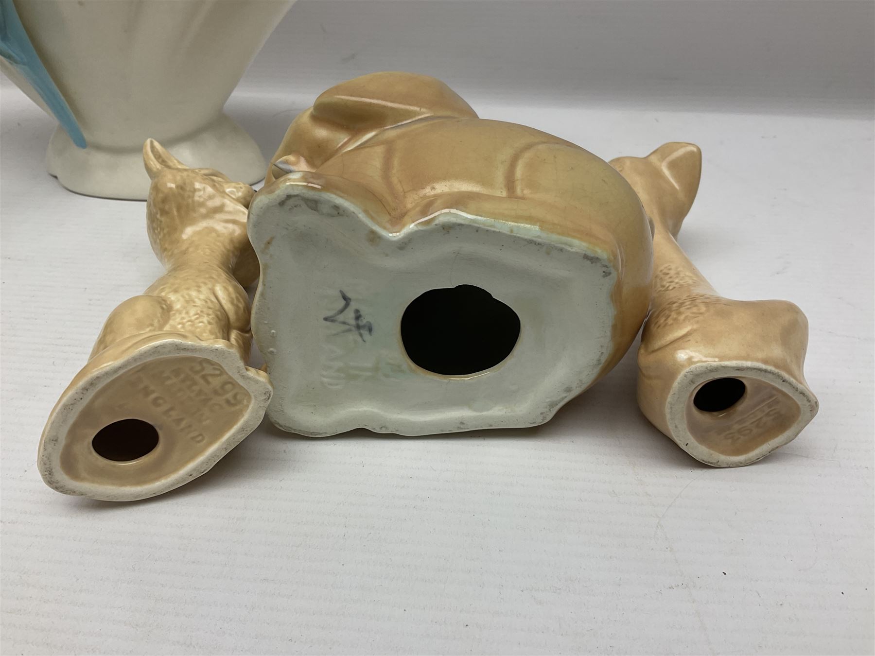 Collection of Sylvac and similar animal figures, including rabbits, hares and dogs, together with Falcon budgie vase, etc 