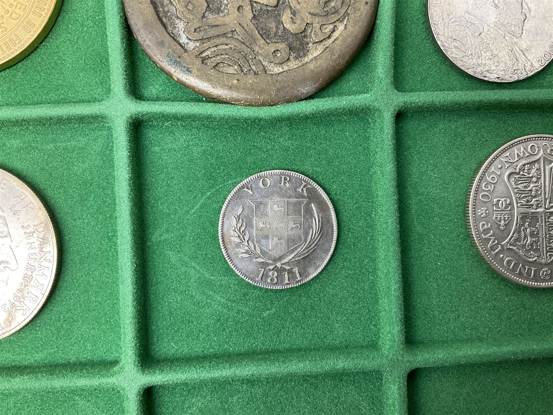 Coins and medallions including, York 1811 one shilling cattle and barber silver token, United States of America 1883O silver Morgan dollar, birds of destiny medal by Malcolm Appleby, Great British King George V 1930 halfcrown, King Edward VII 1902 silver medal, King George V 1916 halfcrown etc, housed in a case with lift out green coin trays