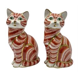 Two Royal Crown Derby Ginger Tom cat paperweights, one with gold stopper and one with silver, both with printed marks beneath, H13cm