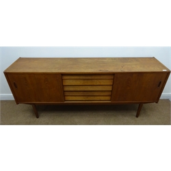  Retro teak sideboard, five drawers flanked by two sliding cupboards, turned tapering supports, W191cm, H79cm, D45cm  