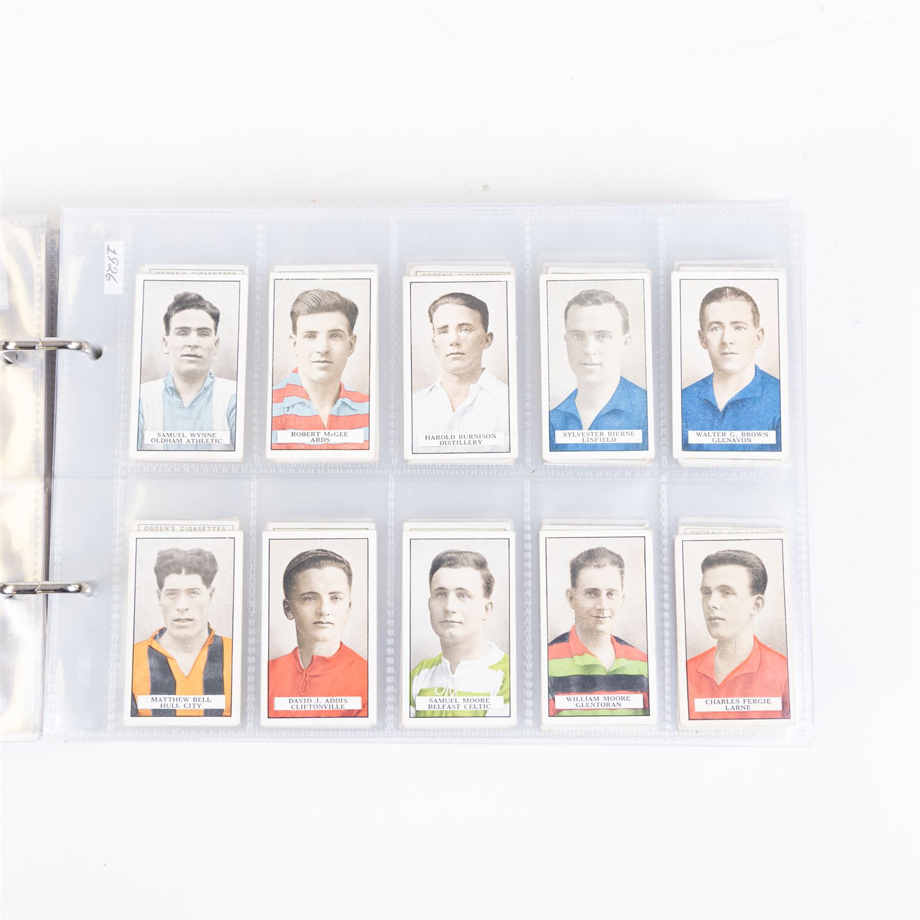 Collection of Edwardian and later Football related trading and cigarette cards, including forty-nine of fifty 1906 Ogden's Football Club Colours, 1922 PALS Footall series, ninety of one hundred 1925 Gallaher Famous Footballers, complete set of forty-four 1926 Ogden's Captains of Association Football Clubs and Colours, complete set of fifty 1927 Players Football Caricatures by MAC,  complete set of fifty 1927 Players Football Caricatures by RIP,  complete set of fifty 1930 Players Association Cup Winners, complete set of 50 1933 Ogdens AFC Nicknames etc, housed in brown cigarette card album