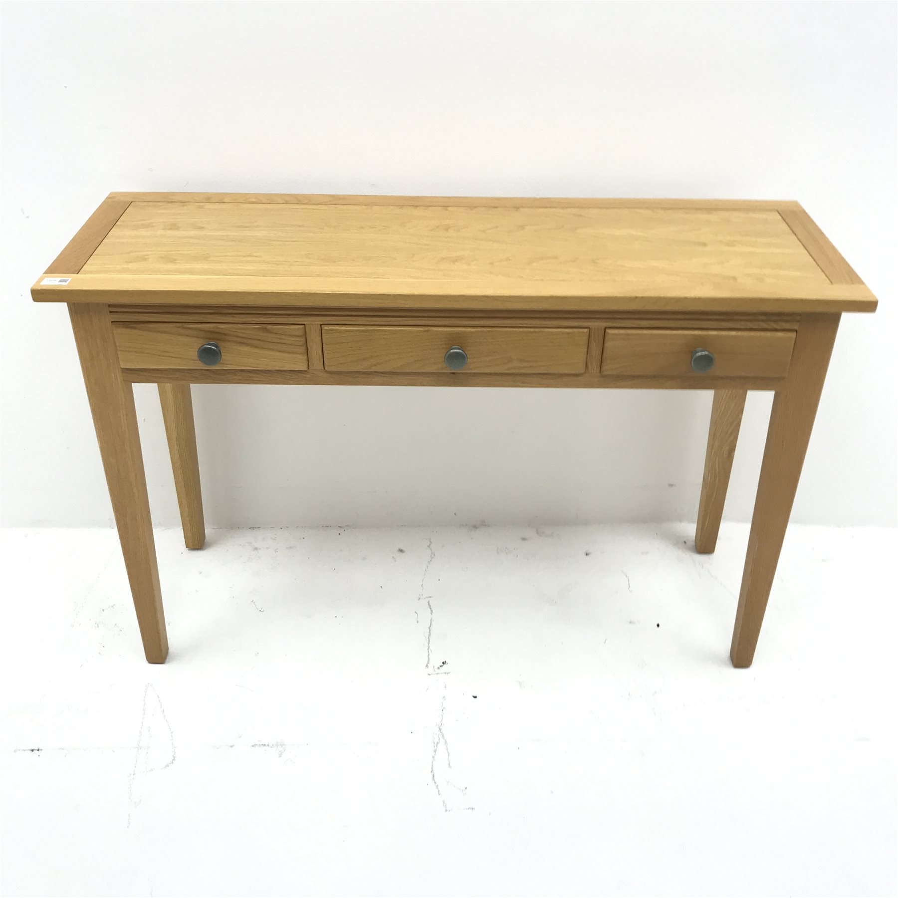 Light oak side table, two short and one long drawers, square tapering