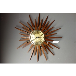  1970s vintage 'Metamec' sunburst wall clock (D63cm), and a 'Anstey & Wilson' teak sunburst wall clock (D61cm)  