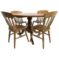 Waxed pine circular pedestal dining table (D122cm, H77cm), and a set of four beech farmhouse design dining chairs
