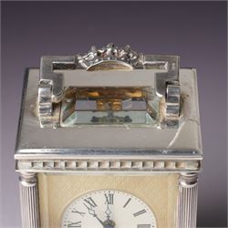 Chas Frodsham -  Miniature carriage clock with platform lever escapement commemorating the marriage of Prince Charles and Lady Diana Spencer, the white dial with an engine turned gilt surround and fleur de lis in silver case with fluted columns and bevelled glass panels H10cm  No.43/1000 London 1981 with key