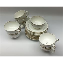 Victorian teawares, decorated with gilt sprigs upon a white glazed ground, to include two tureen and covers, two cake plates, cups, saucers, side plates, etc. 