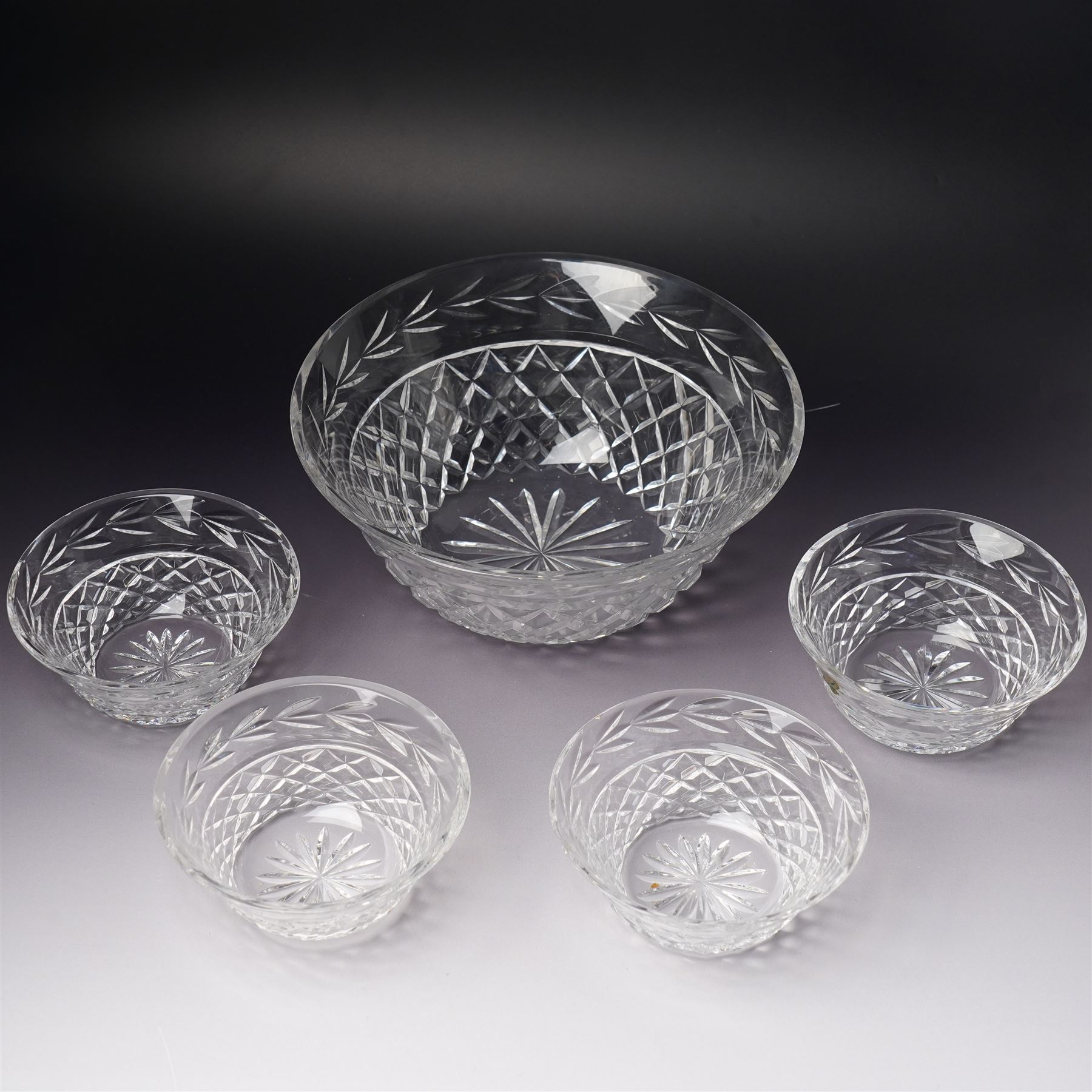 Waterford Crystal 'Glandore' pattern large bowl, boxed, and four smaller 'Glandore' pattern bowls, two boxed (5)