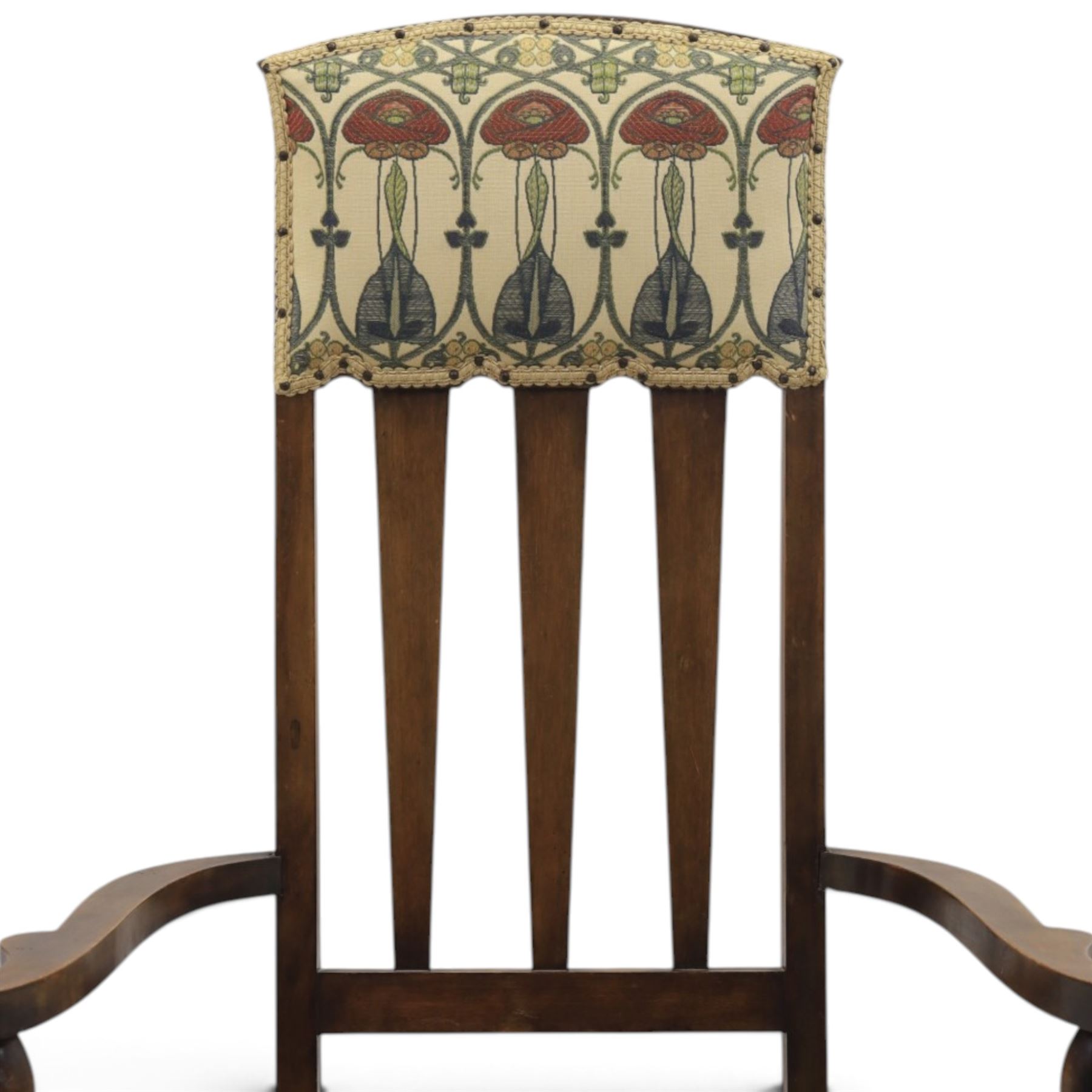 Robson & Sons, Newcastle on Tyne - Arts & Crafts high back armchair, upholstered in Mackintosh style fabric, shaped armrests and cylindrical supports united by stretchers