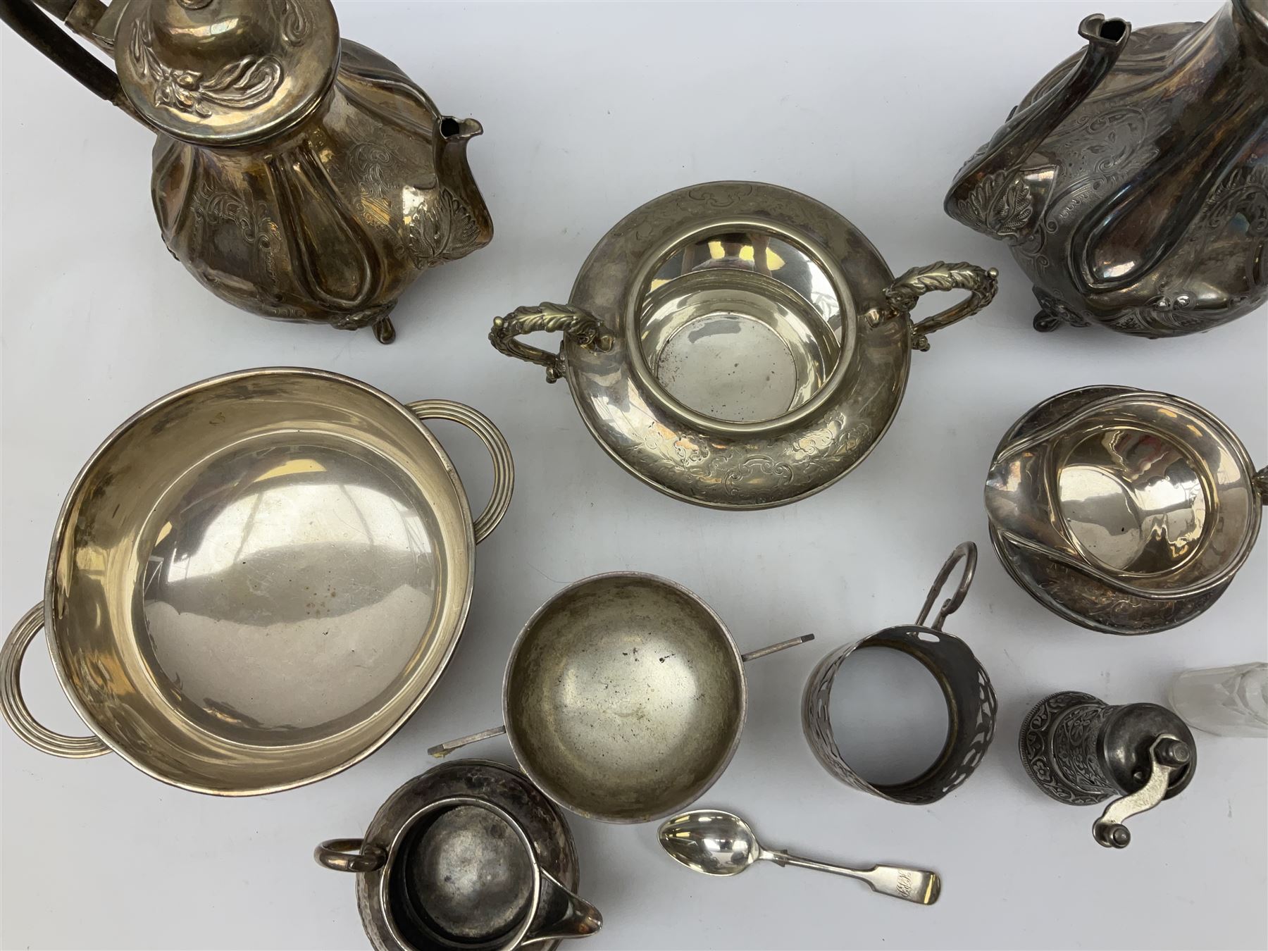 Twin handled silver plated bowl retailed by Harrods, together with two 19th century coffee pots, pewter milk jug and other metalware   