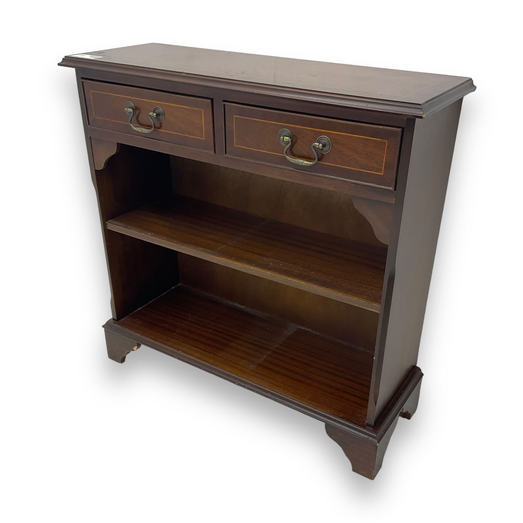 Early 20th century inlaid mahogany open bookcase, rectangular top with boxwood stringing and moulded edge over two short drawers, two open shelves below, on shaped bracket supports