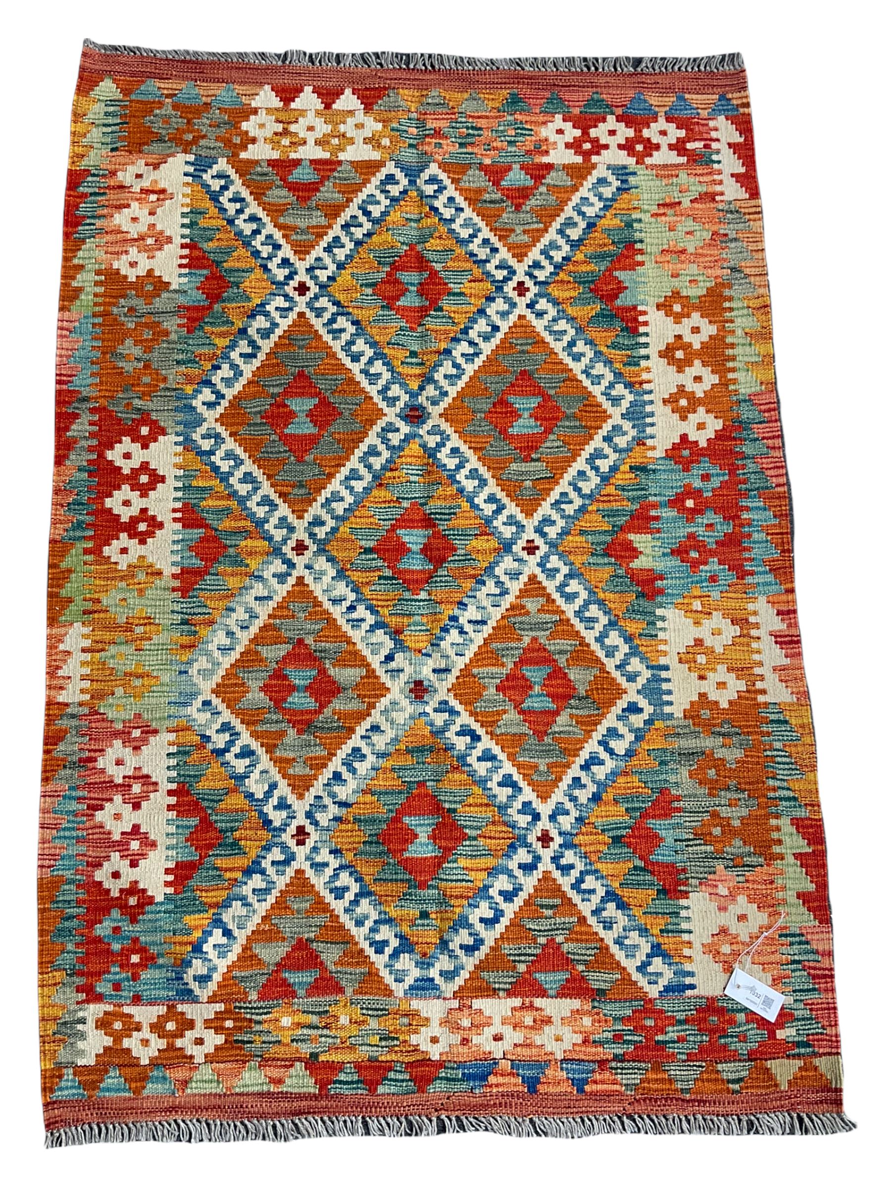 Chobi Kilim rug, orange ground with lozenge and geometric pattern