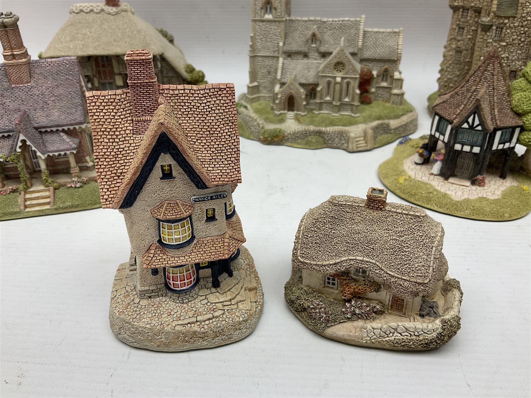 Twelve Lilliput Lanes, including Old Shop Bignor, Dial Cottage, Paradise Lodge, etc, some with deeds and original boxes