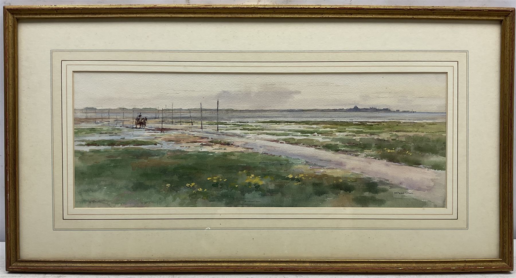 Frank Watson Wood Jnr. (Scottish 1900-1985): The Causeway Lindisfarne, watercolour signed, Aitken Dott & Son Edinburgh label verso 17cm x 47cm 
Provenance: private collection, purchased Tennants 20th September 2014 Lot 1045