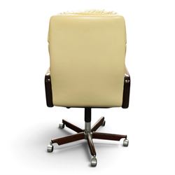 Dyrlund - Santos rosewood office suite, comprising an executive desk and cream leather upholstered swivel chair, the desk with a broad rectangular top with rounded corners, leather writing surface, pen compartments and letter tray, three lockable frieze drawers with fitted interiors above a central kneehole flanked by floating drawer pedestals, the left housing a filing drawer and the right three compartmented drawers, with a full width modesty panel to the reverse, chair raised on a castor base, H 116cm, W 62cm, D 74cm