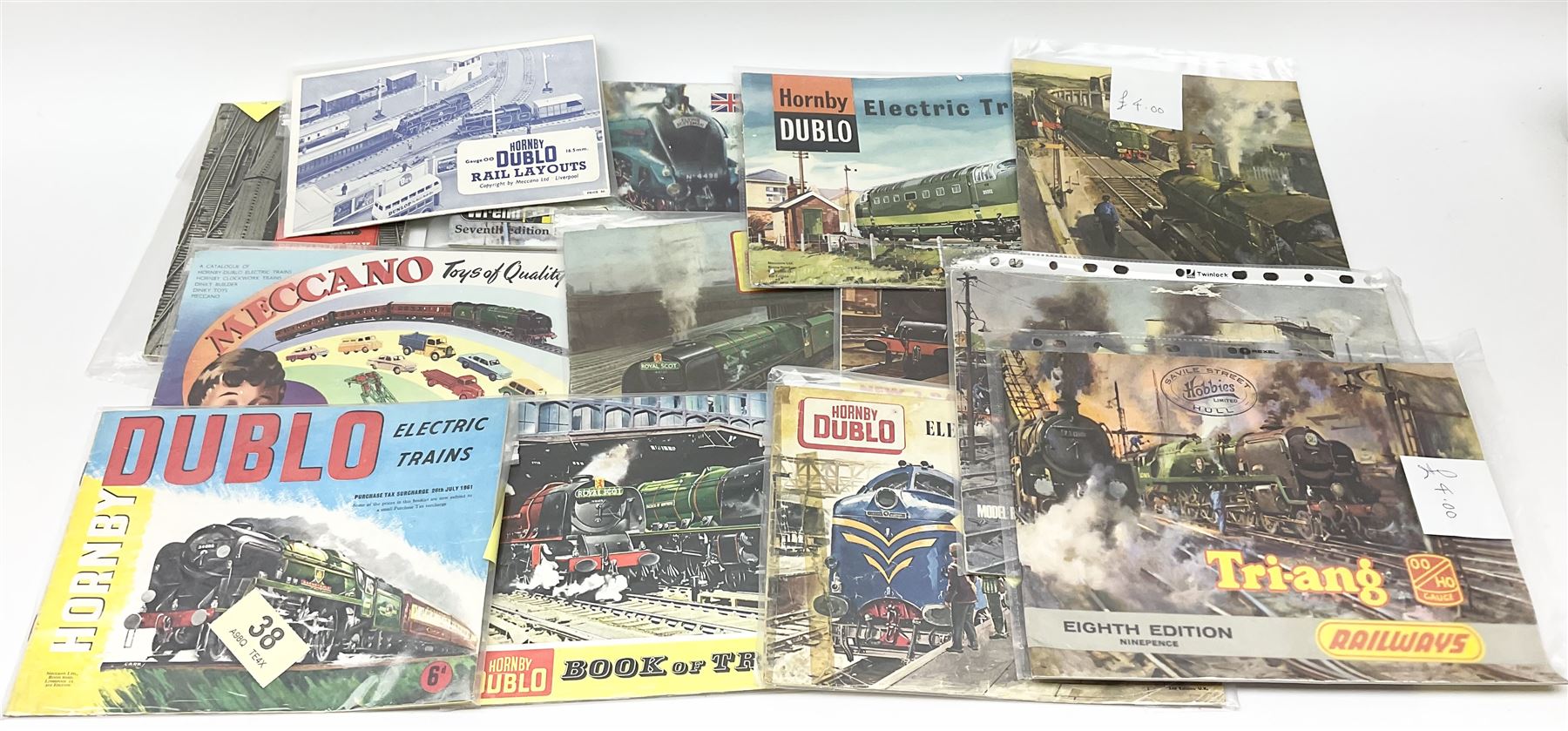 Hornby Dublo - three Electric Trains Catalogues 2nd - 4th editions 1960-62; Book of Trains 1959; New 2-Rail Leaflet 1960; Meccano Catalogue 1958; Rail Layouts booklet; three Tri-ang/Tri-ang Hornby catalogues 8th, 9th and 16th editions; Trix Twin Railway Permanent Way Manual 1953; and Wrenn catalogue 7th edition c1988.