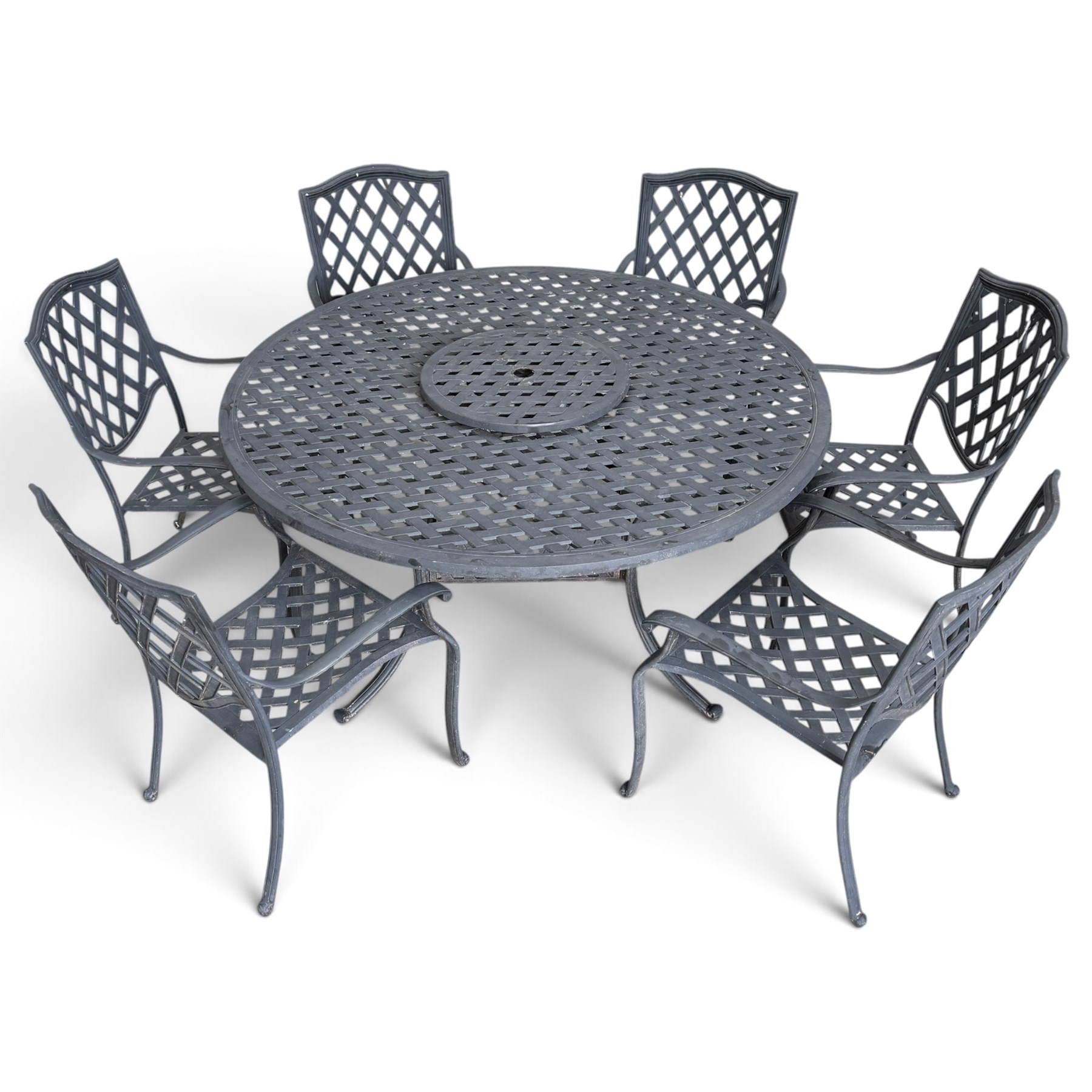 Grey-painted cast metal garden dining suite, comprising circular latticework table on splayed supports (W152cm H72cm), and six matching open armchairs with lattice backs and seats (W61cm H93cm)