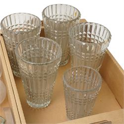 Five ribbed glass vases, glass carafes, pair of Dartington candlesticks and other glass