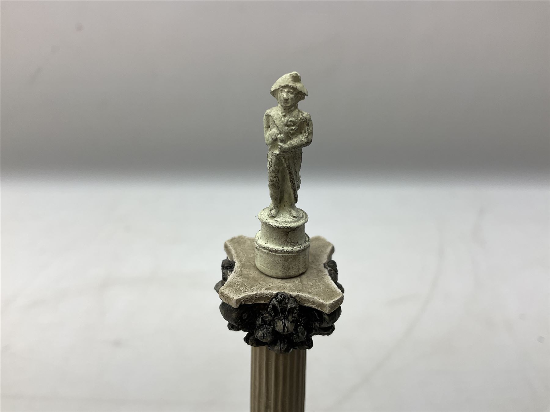 Five Lilliput Lane models from the 'Britain's Heritage' collection, comprising The Royal Albert Hall, Windsor Castle Round Tower, Eros and Nelson's Column and another snowed, all boxed