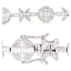 18ct white gold diamond bracelet, eight circular, pave set round brilliant cut and baguette cut diamond clusters, spaced by a single baguette cut diamond and a diamond flower head design cluster, stamped 750, total diamond weight approx 3.70 carat