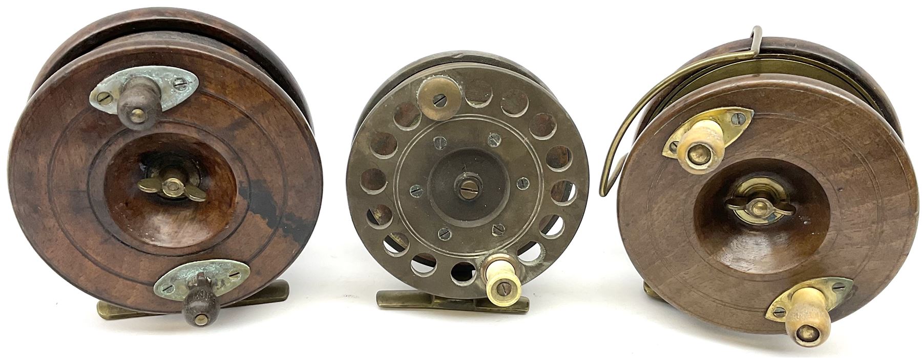 Three Allcocks & Co Ltd reels of brass and wood construction, the largest D4.5 inches