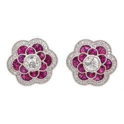  Pair of 18ct white gold (tested) ruby and old cut diamond flower design earrings  