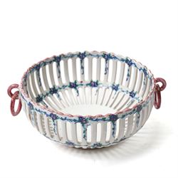 Two 20th century French faience openwork baskets, by Emile Tessier Malicorne, painted with polychromatic floral decoration, with scalloped rims, marked to base, larger 9cm (2)