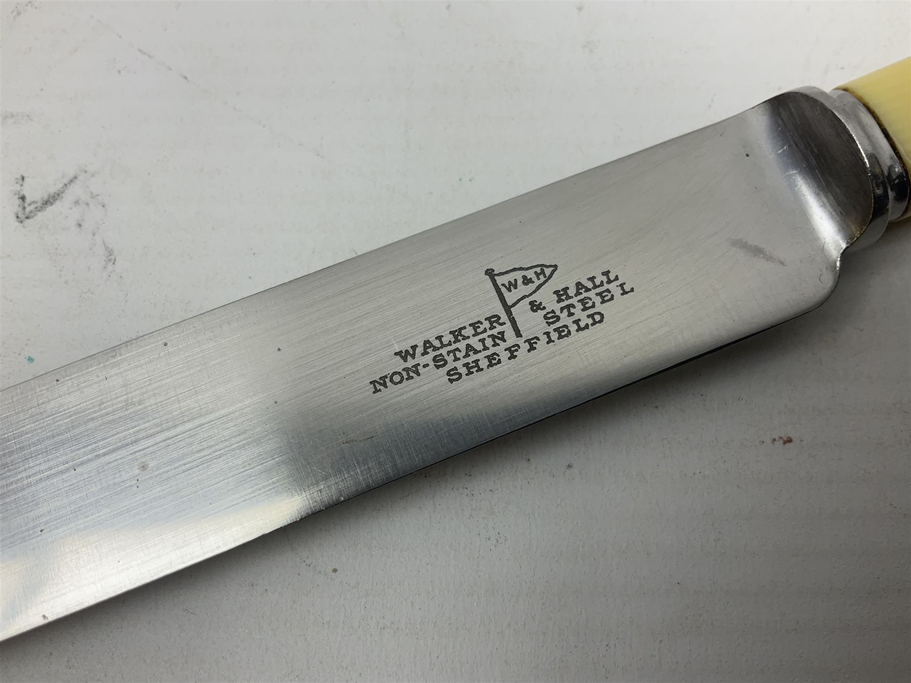 Walker and Hall silver plated canteen of cutlery, oak case, the hinged lid with a engraved brass shield , H12cm, L32cm