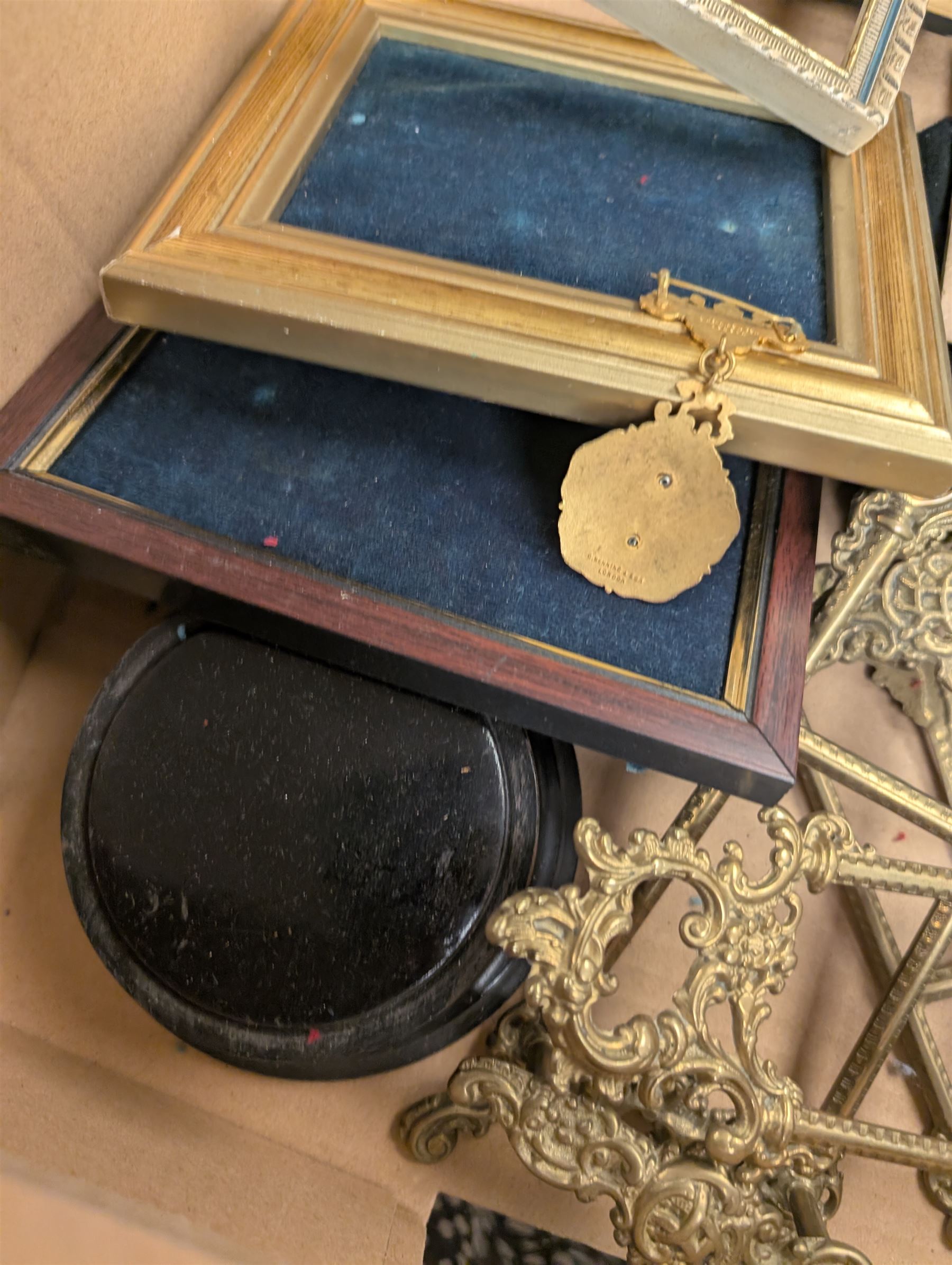Brass easels, onyx box, frames, costume jewellery, pen nibs, etc, in two boxes