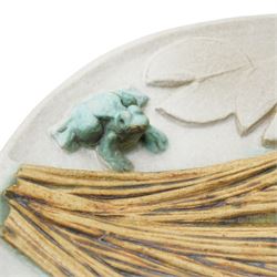 Bernard Rooke (1938-) - Studio pottery shallow dish with a raised pattern of lily pads, iris, frogs and dragon fly W31cm with Bernard Rooke paper label from The Mill Gallery, Swilland, Ipswich and incised 'B R' to the reverse