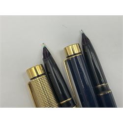 Sheaffer Targa 1011 Diamond Square fountain pen, the gold plated barrel with nib stamped 14K 585, together with another Sheaffer Targa fountain pen with blue barrel and gold nib stamped 14K 585 and matching ballpoint, and Sheaffer ballpoint pen with sterling silver barrel, largest L13.5cm (4)