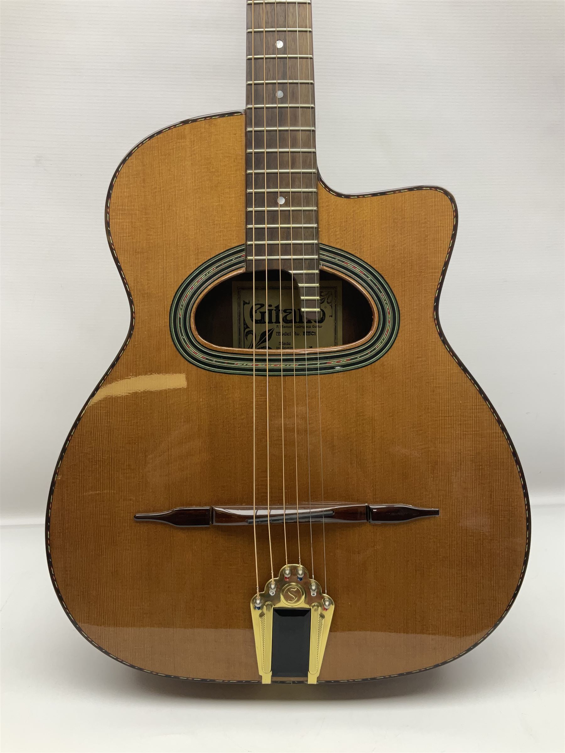 Spanish Gitano Manuel Rodriguez EMC1 Maccaferri acoustic guitar, c2000, the cedar top with D-hole, L98cm overall; in lightweight hard carrying case.