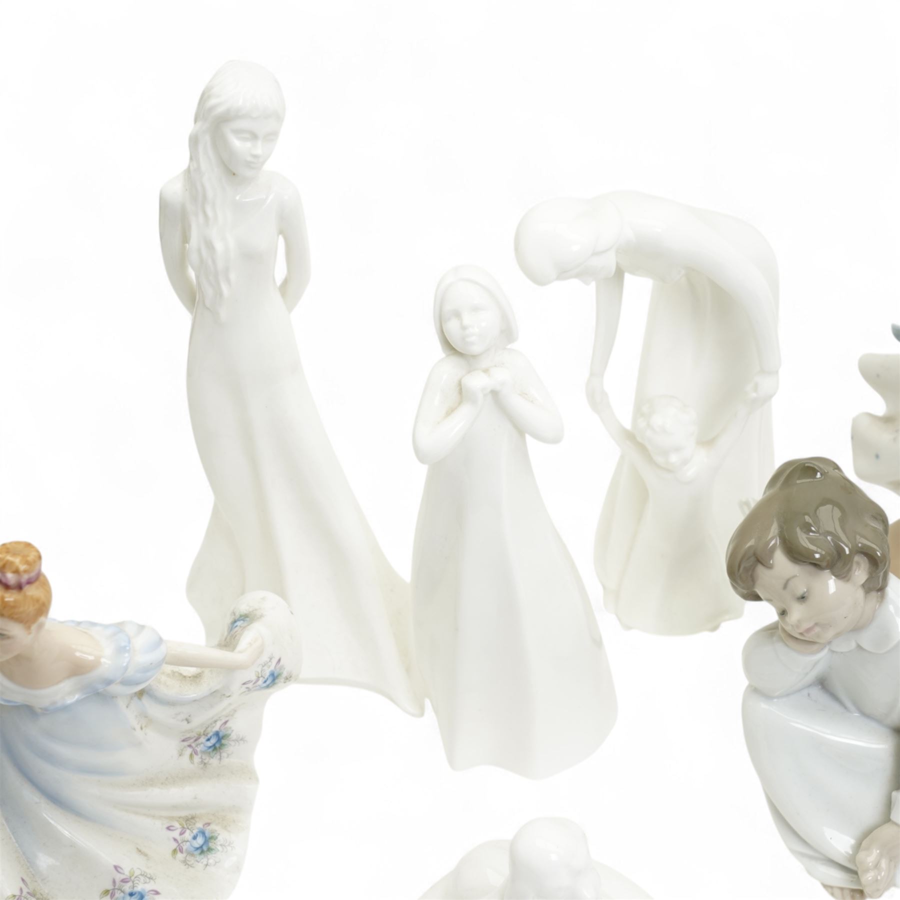   Lladro including Sweet Dreams 1535, Cinderella 4828, Angel Dreaming 4961 and another 4539, eight Royal Doultonfigures from the Images series and one other figure Kathy HN3305