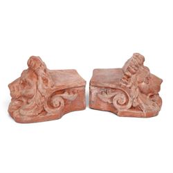Pair of 19th century terracotta lion sash window rests, H18cm, L22cm