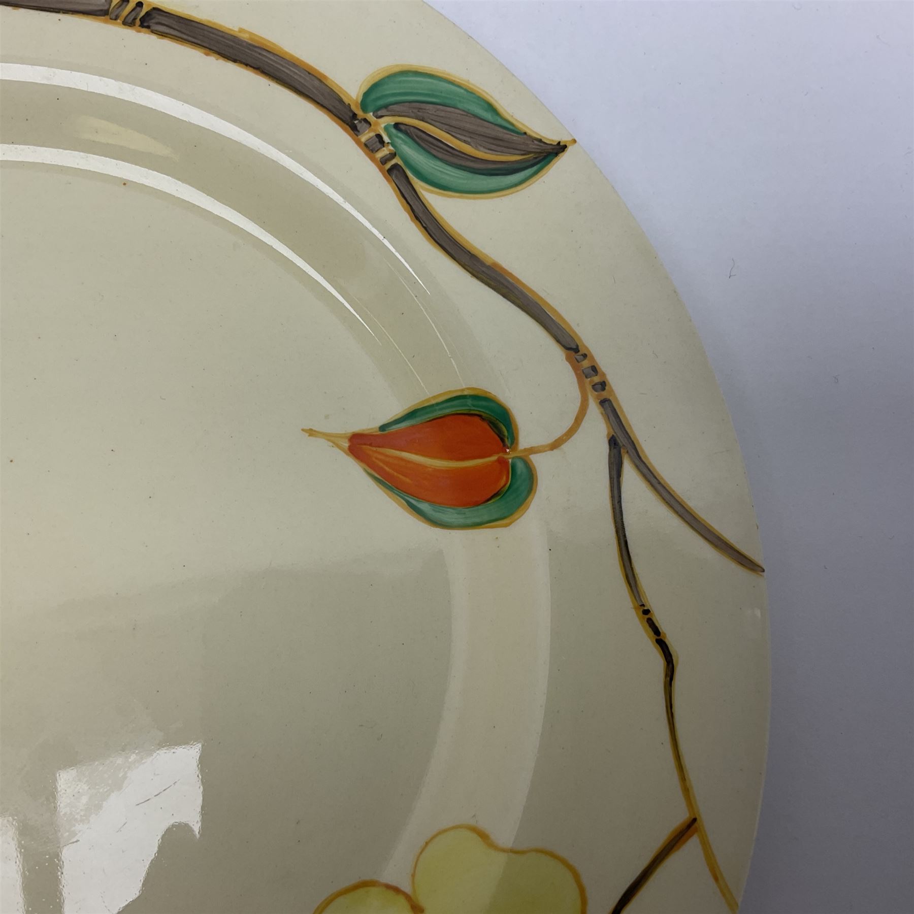 Clarice Cliff for Newport Pottery plate in Yellow Rose pattern, with printed mark beneath, D23cm
