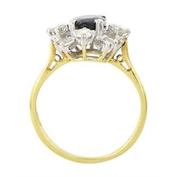 18ct gold sapphire and diamond cluster ring, single oval cut sapphire of approx 1.65 carat, surrounded by four round brilliant cut diamonds and eight baguette cut diamonds, London 1975, total diamond weight approx 0.60 carat