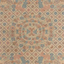Aubusson design pale peach ground rug, woven with an all-over lattice design in rose and cyan with central floral bouquet medallion, the scrolling acanthi and flowerhead spandrels contained within a lattice guard band