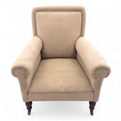 Late 19th century Howard style upholstered armchair, with deep seat and scroll arms, on turned front legs with brass and ceramic castors, the rear leg stamped Smith & Co Bristol No.302 