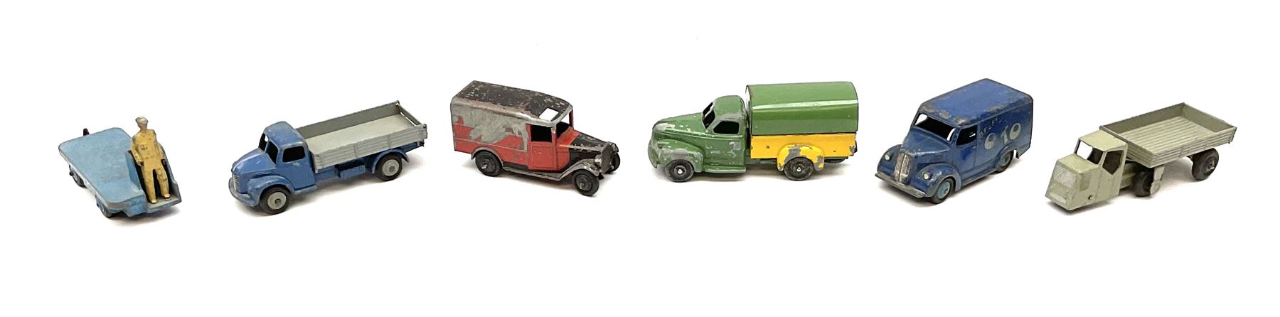 Dinky - six unboxed and playworn early die-cast commercial vehicles including French made Studebaker M16 covered wagon, Trojan Oxo van, B.E.V. Truck, Dodge Tipper, Royal Mail Van etc (6)