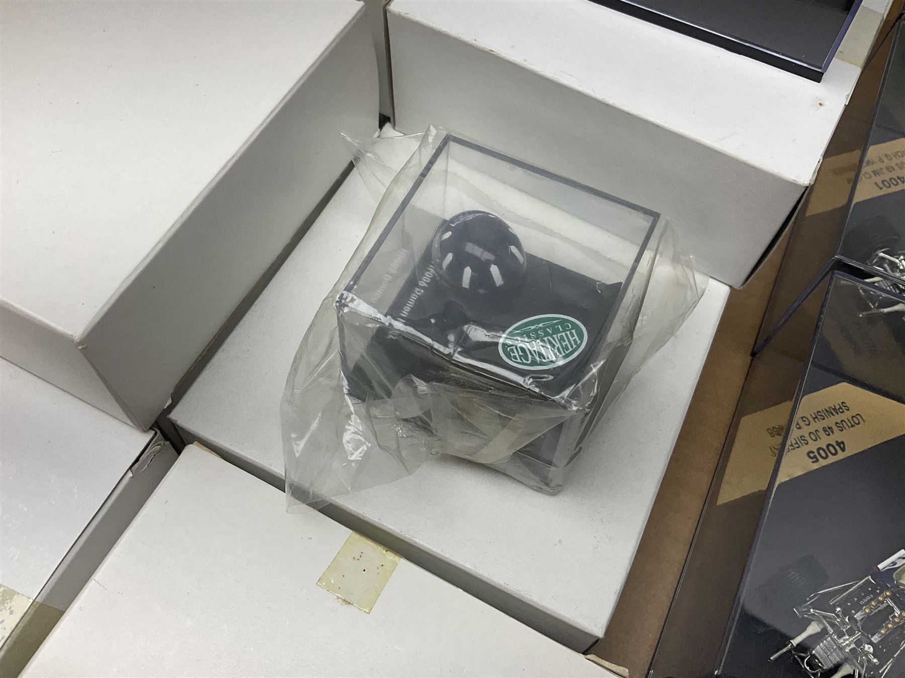 Heritage - thirty-five die-cast model racing cars comprising twenty-five Heritage Formula 1 1:43 scale models including Ferrari, Lotus, Yamaha etc; and ten Special Edition models including Williams Renault Ayrton Senna, David Coulthard and IndyCar, etc with certificates; and a Heritage Classics Damon Hill helmet; all in display boxes, many with original packaging (36)