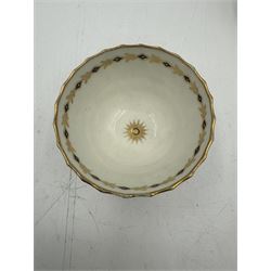 18th century Caughley blue and white sparrow jug, decorated in the Mother and Child pattern, circa 1780-1790, with underglaze C mark beneath, H9cm, together with a Worcester coffee cup, circa 1785 painted with floral sprays in underglaze blue and gilt, with crescent mark beneath, and a Caughley trio of tea cup, tea bowl and saucer, each of moulded wrythen fluted form and decorated with gilt and blue sprigs and bands, each with crescent mark beneath, (5)